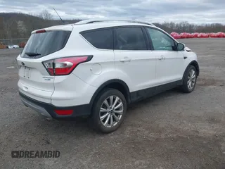 2018 Ford Escape Titanium with VIN 1FMCU9J90JUD53380, listed as a IAAI auction lot 42042802 with 30,371 mi miles and . Bid and sale history available at DreamBid. Image 4.