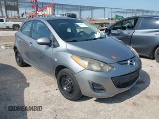 2012 Mazda 2 Sport z VIN JM1DE1KYXC0151752, wystawiony jako IAAI lot #42381999 z przebiegiem 145 071 mil mil oraz . Historia ofert i sprzedaży dostępna na DreamBid. Obrazek 1.
