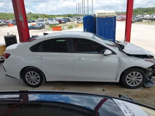 2021 Kia Forte LXS with VIN 3KPF24AD8ME338790, listed as a IAAI auction lot 42547558 with 58,308 mi miles and . Bid and sale history available at DreamBid. Image 14.