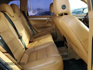2010 Porsche Cayenne z VIN WP1AA2AP0ALA01057, wystawiony jako Copart lot #86414274 z przebiegiem 145 190 mil mil oraz Szkody całkowita. Historia ofert i sprzedaży dostępna na DreamBid. Obrazek 11.