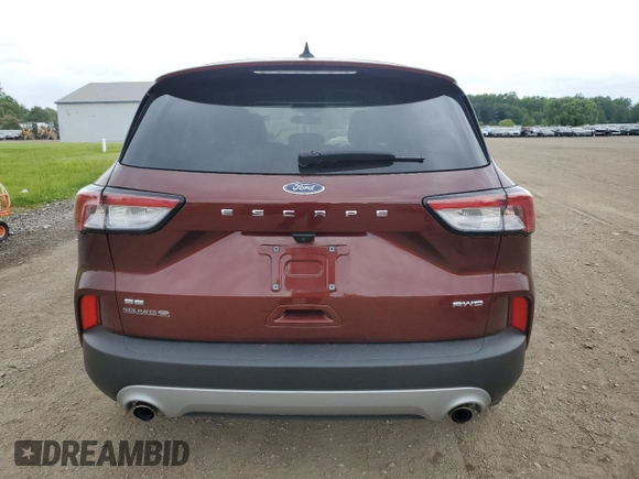 2021 Ford Escape SE z VIN 1FMCU9G6XMUA97492, wystawiony jako Copart lot #59129685 z przebiegiem 27 028 mil mil oraz Szkoda całkowita • Salvage title. Historia ofert i sprzedaży dostępna na DreamBid. Obrazek 6.