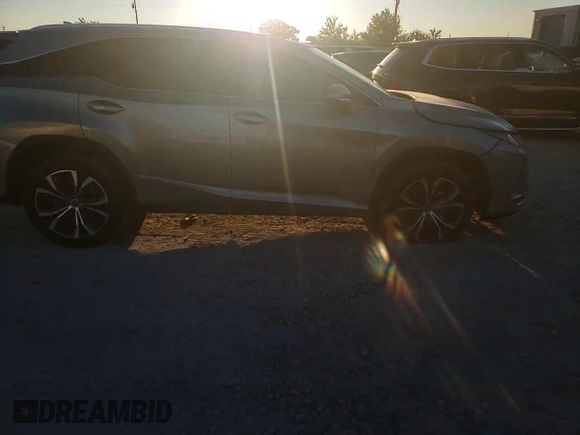 2021 Lexus RX 350L z VIN JTJHZKEA0M2019757, wystawiony jako Copart lot #71006144 z przebiegiem Nie podano mil oraz Szkoda całkowita • Salvage title. Historia ofert i sprzedaży dostępna na DreamBid. Obrazek 12.