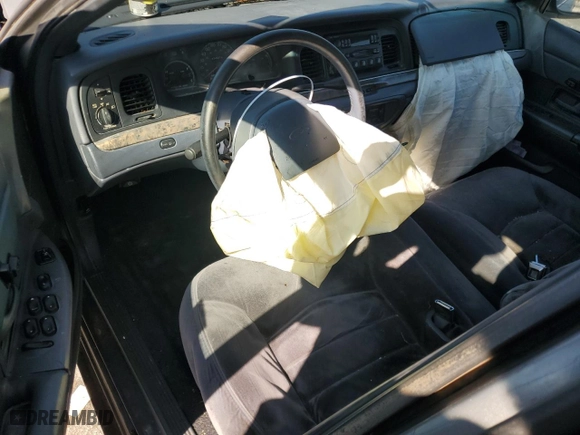1999 Ford Crown Victoria LX with VIN 2FAFP74W6XX235761, listed as a Copart auction lot 43565595 with 224,979 mi miles and Salvage Title. Bid and sale history available at carsss.com. Image 8.