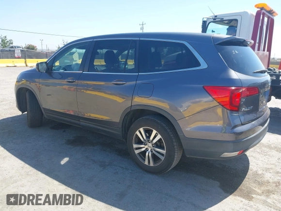 2017 Honda Pilot EX-L with VIN 5FNYF6H59HB032480, listed as a IAAI auction lot 42488789 with 112,595 mi miles and . Bid and sale history available at DreamBid. Image 3.