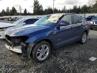 2015 BMW X4 xDrive28i with VIN 5UXXW3C52F0M87375, listed as a Copart auction lot 41140544 with 123,818 mi miles. Bid and sale history available at carsss.com. Image 1.