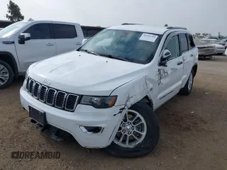 2020 Jeep Grand Cherokee Laredo E with VIN 1C4RJEAG4LC245884, listed as a IAAI auction lot 42564754 with 63,356 mi miles and . Bid and sale history available at DreamBid. Image 18.