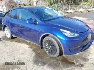 2023 Tesla Model Y Long Range with VIN 7SAYGDEE4PA042757, listed as a IAAI auction lot 41652541 with 48,569 mi miles. Bid and sale history available at carsss.com. Image 1.