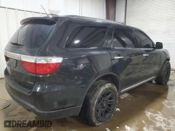 2013 Dodge Durango Crew with VIN 1C4SDJDT8DC509541, listed as a Copart auction lot 54063395 with 145,471 mi miles and Salvage title. Bid and sale history available at DreamBid. Image 3.