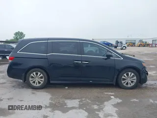 2014 Honda Odyssey EX-L with VIN 5FNRL5H64EB114709, listed as a IAAI auction lot 42131146 with 145,616 mi miles and . Bid and sale history available at DreamBid. Image 13.