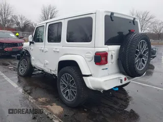 2024 Jeep Wrangler High Altitude z VIN 1C4RJXU6XRW209302, wystawiony jako IAAI lot #41116289 z przebiegiem 2 862 mil mil oraz . Historia ofert i sprzedaży dostępna na DreamBid. Obrazek 3.