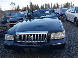 2008 Mercury Grand Marquis z VIN 2MHHM75V98X614175, wystawiony jako IAAI lot #41179107 z przebiegiem 114 607 mil mil oraz . Historia ofert i sprzedaży dostępna na DreamBid. Obrazek 12.