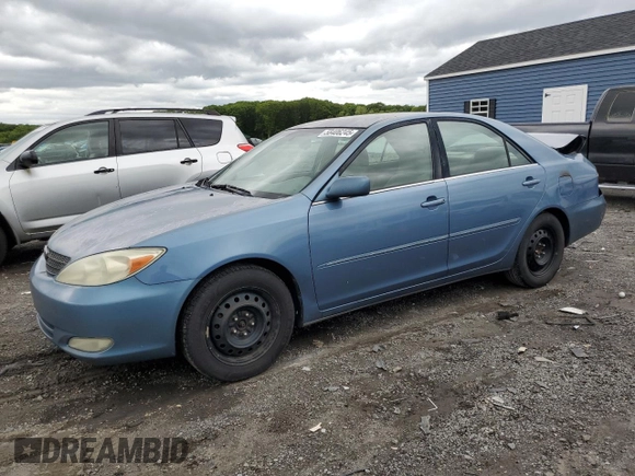 2004 Toyota Camry LE z VIN 4T1BE30K94U892207, wystawiony jako Copart lot #58406245 z przebiegiem 318 751 mil mil oraz Czysty tytuł • Clean title. Historia ofert i sprzedaży dostępna na DreamBid. Obrazek 1.