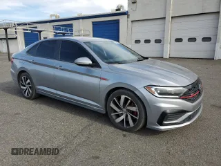 2019 Volkswagen Jetta GLI S z VIN 3VW6T7BU1KM244828, wystawiony jako Copart lot #56495205 z przebiegiem 112 512 mil mil oraz Szkody całkowita. Historia ofert i sprzedaży dostępna na DreamBid. Obrazek 4.