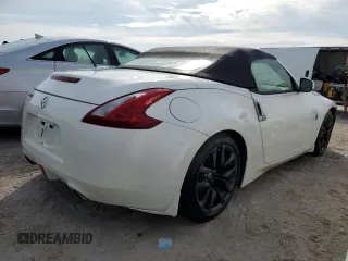 2014 Nissan 370Z Touring with VIN JN1AZ4FH8EM621259, listed as a Copart auction lot 77571454 with Not Provided miles and Salvage Title. Bid and sale history available at DreamBid. Image 3.