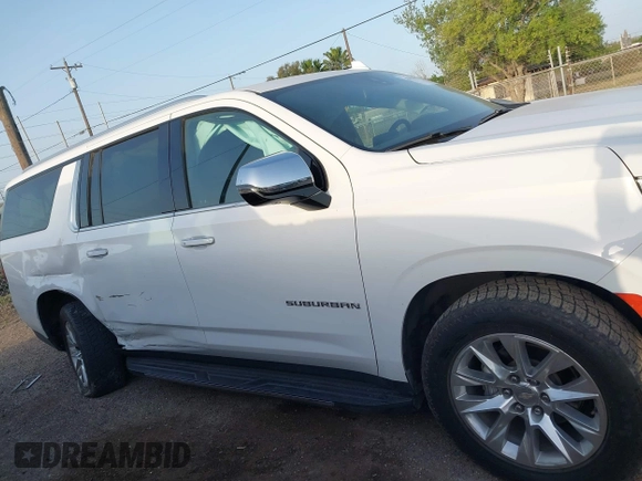 2022 Chevrolet Suburban Premier with VIN 1GNSCFKDXNR180648, listed as a IAAI auction lot 41853881 with 73,023 mi miles and . Bid and sale history available at DreamBid. Image 13.