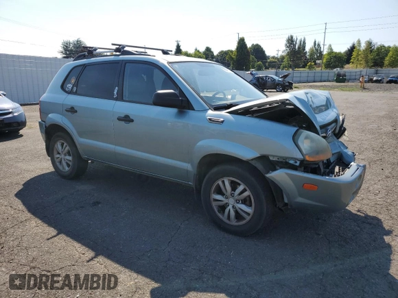 2009 Hyundai Tucson GLS with VIN KM8JM12B29U953176, listed as a Copart auction lot 70141174 with 77,132 mi miles and Salvage Title. Bid and sale history available at carsss.com. Image 4.