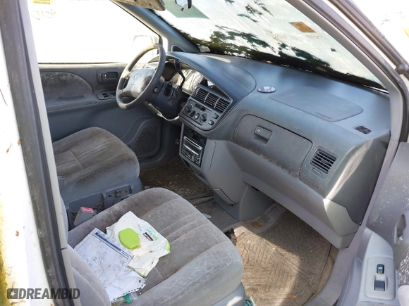 1998 Toyota Sienna LE with VIN 4T3ZF13C1WU052050, listed as a IAAI auction lot 41921780 with 144,769 mi miles. Bid and sale history available at carsss.com. Image 5.