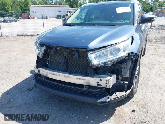 2019 Toyota Highlander SE with VIN 5TDKZRFH1KS290412, listed as a IAAI auction lot 42272229 with 74,212 mi miles and . Bid and sale history available at DreamBid. Image 6.
