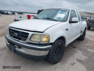 2002 Ford F-150 XL with VIN 1FTRX07262KB49014, listed as a IAAI auction lot 41518904 with 1 mi miles. Bid and sale history available at carsss.com. Image 2.