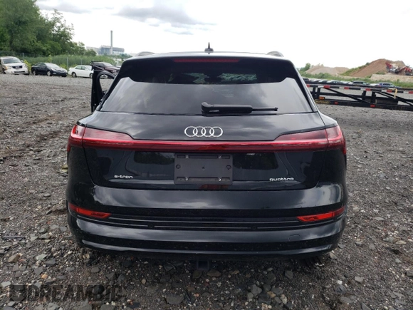 2023 Audi e-tron Premium Plus with VIN WA1LAAGE2PB007879, listed as a Copart auction lot 63622544 with Not provided miles and Salvage title. Bid and sale history available at DreamBid. Image 6.