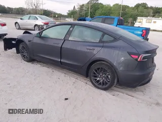 2024 Tesla Model 3 with VIN 5YJ3E1EA0RF748588, listed as a IAAI auction lot 41900733 with 2,547 mi miles. Bid and sale history available at carsss.com. Image 3.
