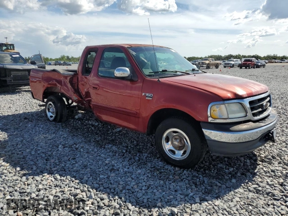 2000 Ford F-150 XL with VIN 1FTRX17W3YNB80866, listed as a Copart auction lot 61151005 with Not provided miles and Salvage title. Bid and sale history available at DreamBid. Image 4.