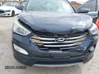 2013 Hyundai Santa Fe Sport z VIN 5XYZW3LAXDG066096, wystawiony jako IAAI lot #41717516 z przebiegiem 135 922 mil mil oraz . Historia ofert i sprzedaży dostępna na DreamBid. Obrazek 6.