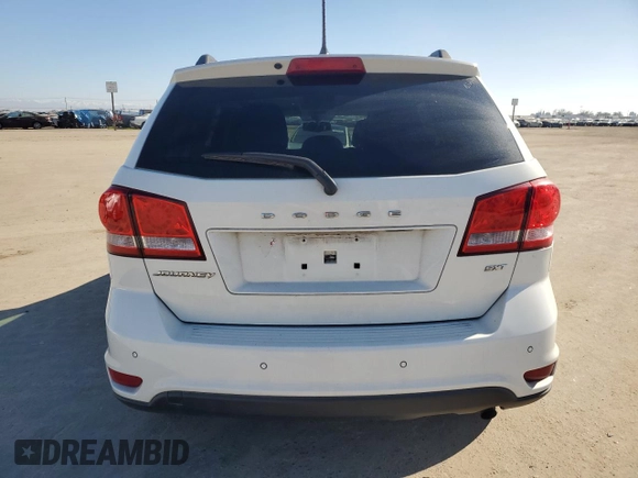 2017 Dodge Journey SXT with VIN 3C4PDCBB8HT675449, listed as a Copart auction lot 88999075 with 105,765 mi miles and Salvage Title. Bid and sale history available at DreamBid. Image 6.