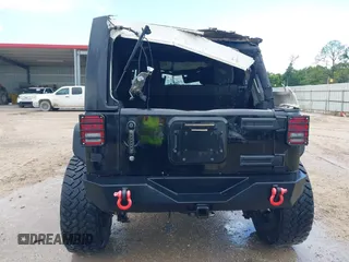 2015 Jeep Wrangler Unlimited Rubicon Hard Rock with VIN 1C4HJWFG0FL674700, listed as a IAAI auction lot 42511949 with 138,370 mi miles and . Bid and sale history available at DreamBid. Image 16.
