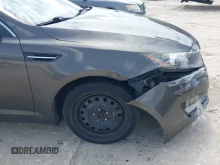 2013 Kia Optima EX z VIN 5XXGN4A77DG251606, wystawiony jako IAAI lot #42377401 z przebiegiem 135 067 mil mil oraz . Historia ofert i sprzedaży dostępna na DreamBid. Obrazek 12.