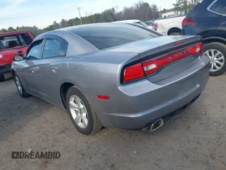 2014 Dodge Charger SE with VIN 2C3CDXBG5EH251804, listed as a IAAI auction lot 41659780 with 207,956 mi miles. Bid and sale history available at carsss.com. Image 3.