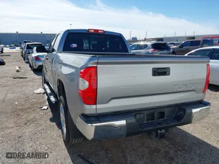 2018 Toyota Tundra 2WD SR with VIN 5TFRM5F11JX131505, listed as a IAAI auction lot 41244160 with 73,799 mi miles. Bid and sale history available at carsss.com. Image 3.