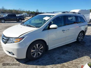 2014 Honda Odyssey Touring with VIN 5FNRL5H90EB053451, listed as a IAAI auction lot 41377042 with 138,000 mi miles. Bid and sale history available at carsss.com. Image 18.