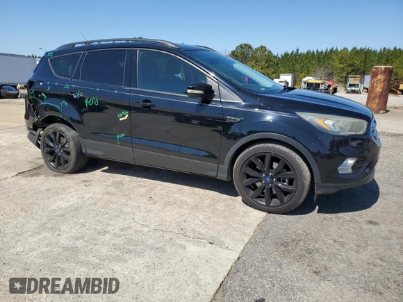 2017 Ford Escape Titanium with VIN 1FMCU0J93HUE84535, listed as a Copart auction lot 48172295 with 92,973 mi miles and Salvage Title. Bid and sale history available at carsss.com. Image 4.