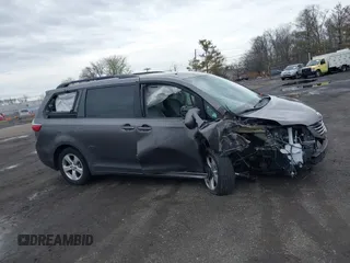 2015 Toyota Sienna LE AAS with VIN 5TDKK3DC1FS615090, listed as a IAAI auction lot 41965112 with 116,745 mi miles. Bid and sale history available at carsss.com. Image 13.