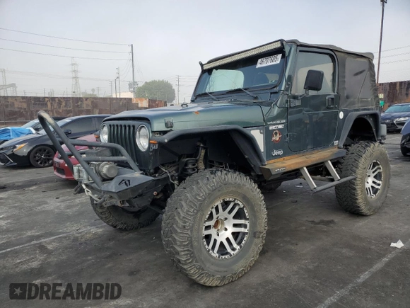 2002 Jeep Wrangler Sahara with VIN 1J4FA59S42P742978, listed as a Copart auction lot 46707685 with 77,272 mi miles and Salvage Title. Bid and sale history available at carsss.com. Image 1.