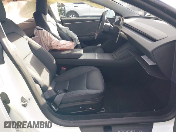 2024 Tesla Model 3 with VIN 5YJ3E1EA8RF786196, listed as a IAAI auction lot 40780675 with 5,959 mi miles and . Bid and sale history available at DreamBid. Image 5.