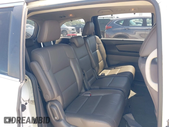 2012 Honda Odyssey EX-L with VIN 5FNRL5H61CB019215, listed as a IAAI auction lot 41837320 with 248,498 mi miles and . Bid and sale history available at DreamBid. Image 8.