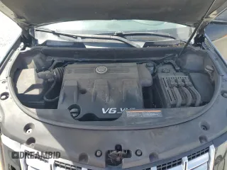 2013 Cadillac SRX Performance Collection z VIN 3GYFNHE37DS609463, wystawiony jako Copart lot #54606255 z przebiegiem 180 059 mil mil oraz Szkoda całkowita • Salvage title. Historia ofert i sprzedaży dostępna na DreamBid. Obrazek 12.