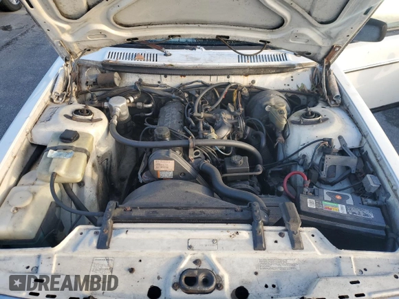 1991 Volvo 240 z VIN YV1AA8844M1441146, wystawiony jako Copart lot #75018744 z przebiegiem 159 330 mil mil oraz Nie do naprawy • Non repairable. Historia ofert i sprzedaży dostępna na DreamBid. Obrazek 11.