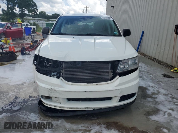 2014 Dodge Journey American Value with VIN 3C4PDCAB3ET216889, listed as a Copart auction lot 60874265 with 117,508 mi miles and Salvage title. Bid and sale history available at DreamBid. Image 5.