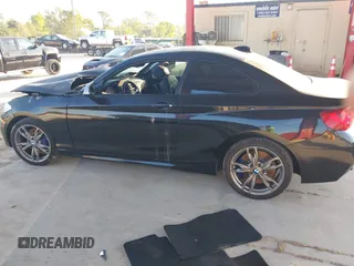 2016 BMW 2 Series M235i with VIN WBA1J7C55GV360926, listed as a IAAI auction lot 41482584 with 60,172 mi miles. Bid and sale history available at carsss.com. Image 14.