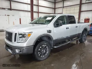 2017 Nissan Titan XD PRO-4X with VIN 1N6BA1F42HN515535, listed as a IAAI auction lot 41770534 with 73,733 mi miles. Bid and sale history available at carsss.com. Image 2.