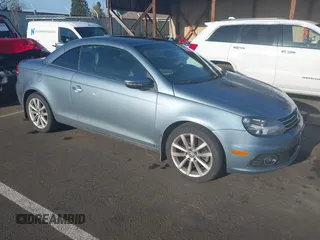 2012 Volkswagen Eos Komfort with VIN WVWBW7AH1CV022066, listed as a IAAI auction lot 41950391 with 98,877 mi miles and . Bid and sale history available at DreamBid. Image 1.
