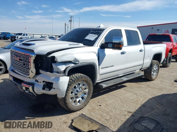 2019 GMC Sierra 2500HD Denali with VIN 1GT12SEY8KF139611, listed as a IAAI auction lot 41641028 with 69,776 mi miles. Bid and sale history available at carsss.com. Image 2.