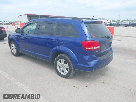 2012 Dodge Journey SXT with VIN 3C4PDCBB0CT323362, listed as a IAAI auction lot 42528338 with 187,995 mi miles and . Bid and sale history available at DreamBid. Image 3.