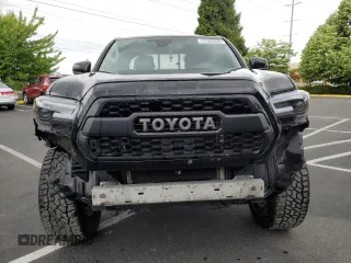 2022 Toyota Tacoma SR z VIN 3TYRZ5CN1NT016153, wystawiony jako Copart lot #56624785 z przebiegiem 88 633 mil mil oraz Czysty tytuł • Clean title. Historia ofert i sprzedaży dostępna na DreamBid. Obrazek 5.