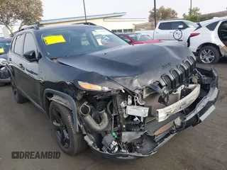 2018 Jeep Cherokee Latitude with VIN 1C4PJLCXXJD556624, listed as a IAAI auction lot 42464810 with 63,570 mi miles and . Bid and sale history available at DreamBid. Image 1.