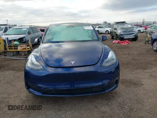 2023 Tesla Model Y Long Range with VIN 7SAYGDEE6PF947827, listed as a IAAI auction lot 41443524 with 12,381 mi miles and . Bid and sale history available at DreamBid. Image 12.