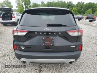2020 Ford Escape SE z VIN 1FMCU0G64LUB62346, wystawiony jako Copart lot #61041265 z przebiegiem 34 474 mil mil oraz Szkoda całkowita • Salvage title. Historia ofert i sprzedaży dostępna na DreamBid. Obrazek 6.